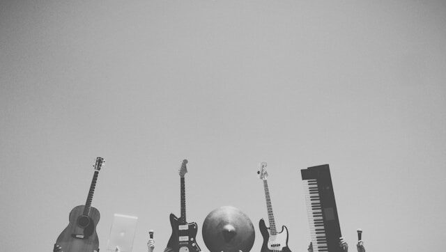 Musicians holding their instruments