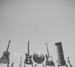 Musicians holding their instruments